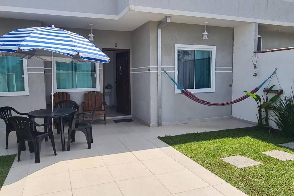 Casa A Poucos Metros Da Praia! 구아라투바 외부 사진